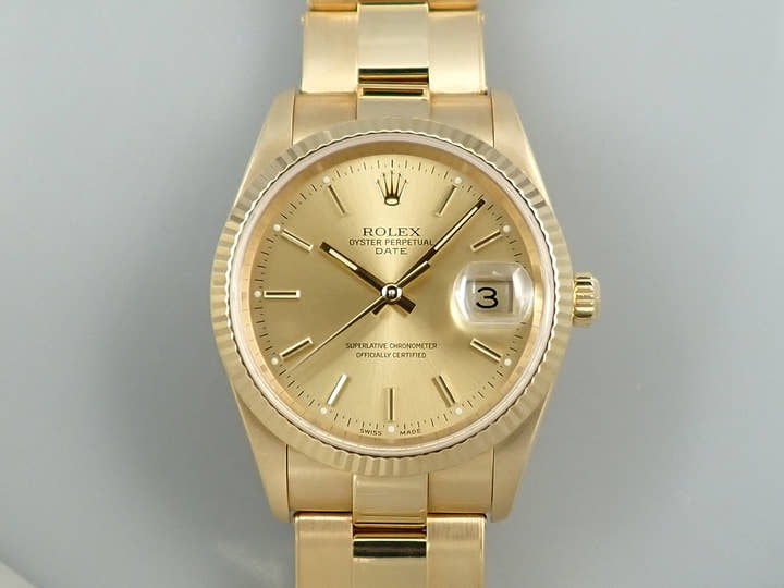 Rolex Oyster Perpetual Date Ref. 15238 Yellow Gold Champagne Dial