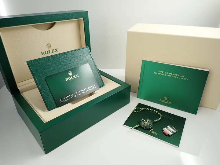 Rolex Oyster Perpetual 41 Ref. 124300 Stainless Steel Green Dial