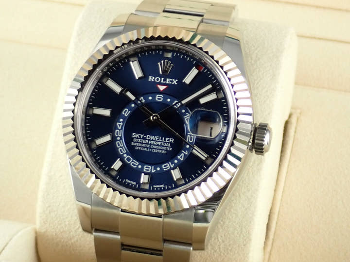 Pre-owned Rolex Sky-Dweller Ref. 326934 with blue dial and Oyster bracelet.