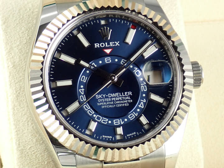 Pre-owned Rolex Sky-Dweller Ref. 326934 with blue dial and Oyster bracelet.