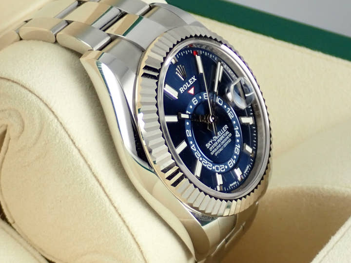 Pre-owned Rolex Sky-Dweller Ref. 326934 with blue dial and Oyster bracelet.