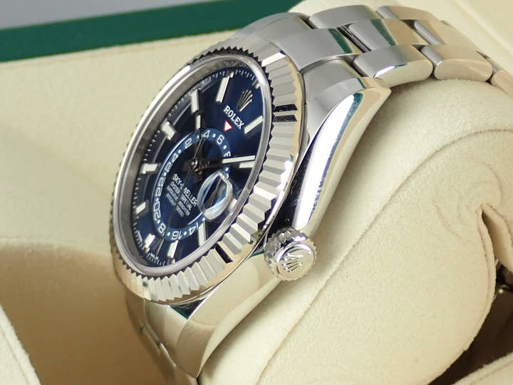 Pre-owned Rolex Sky-Dweller Ref. 326934 with blue dial and Oyster bracelet.