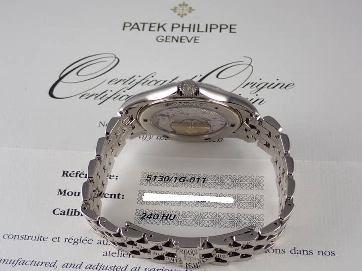 パテックフィリップ ワールドタイム Ref.5130/1G シルバー／グレー文字盤 中古 worldtime-24